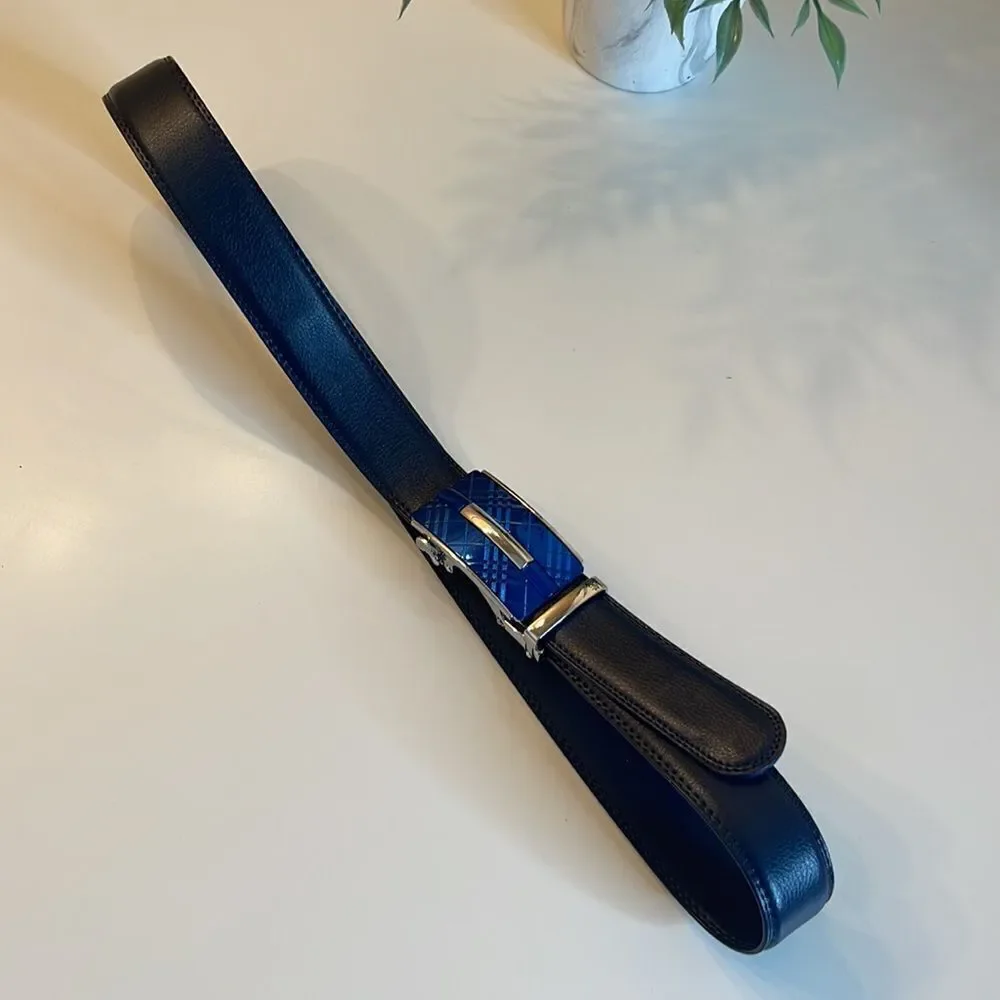Itiezy leather belt.  Blue and Silver. Size up to 36 inches.  NWOT.